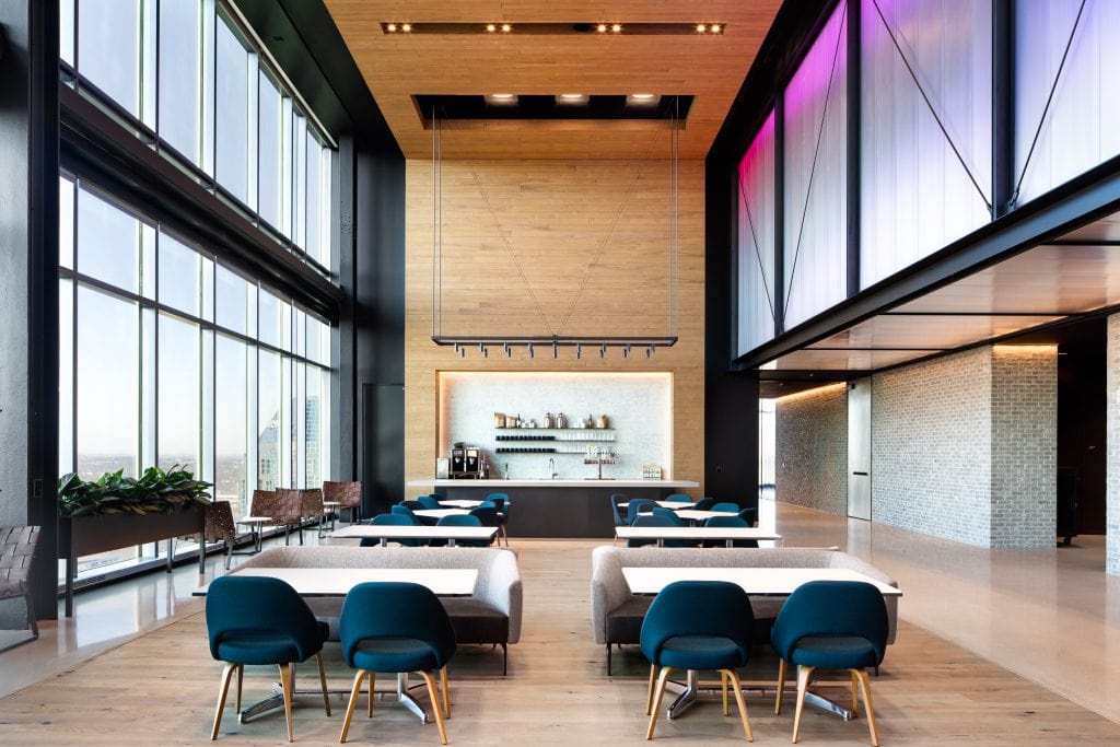 Alliance Bernstein 15 Contemporary office cafe with high ceilings, wood accents, and panoramic windows overlooking Nashville.