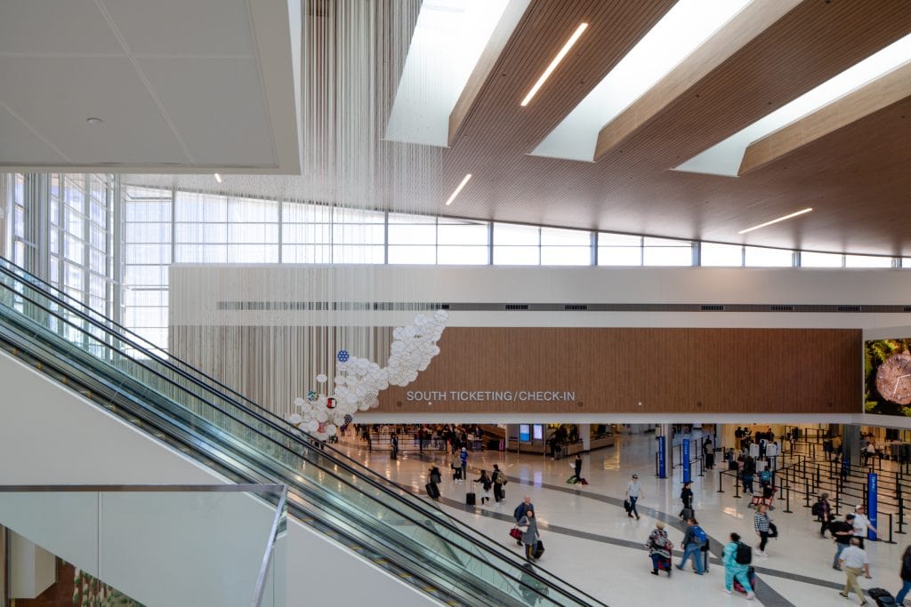 BNA - Nashville Airport 7 South ticketing and check-in area at Nashville International Airport with suspended artwork.