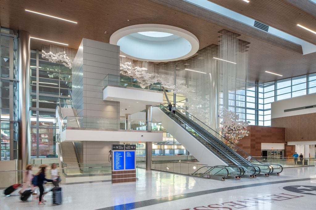 BNA - Nashville Airport 9 Escalators in the terminal lobby with suspended art installation at Nashville International Airport.