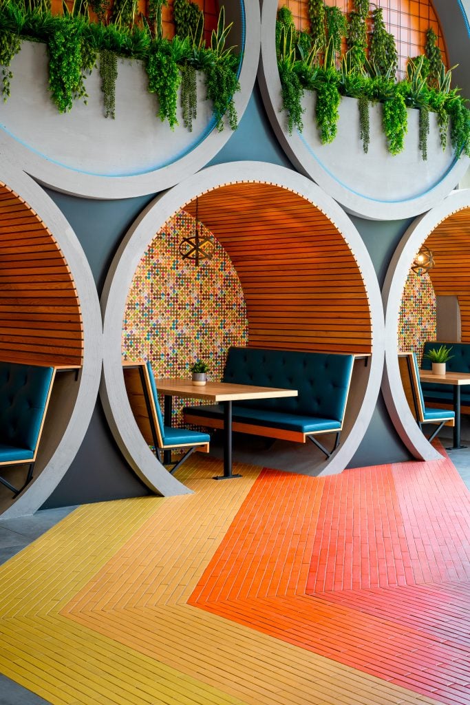 Broadstone Craft 8 Alternate view of barrel seating with vibrant design features.