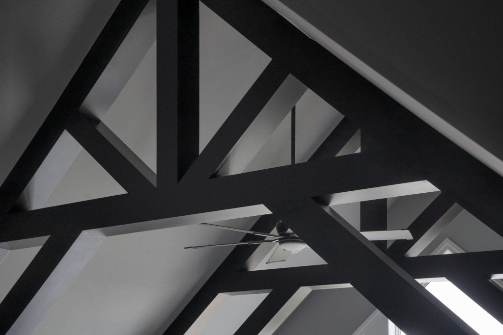 Crystal Lake 6 Cathedral ceiling with exposed beam trusses.