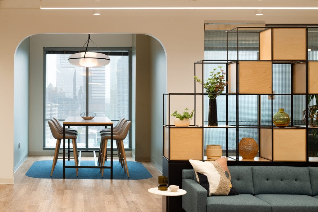 Capgemini Atlanta 2 Open office seating with decorative shelving and city skyline.