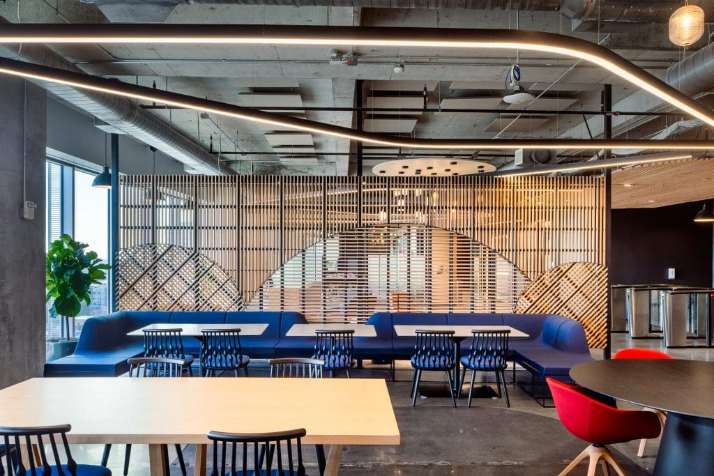 Capgemini Nashville 4 Cafeteria with modern wooden paneling and stylish seating.