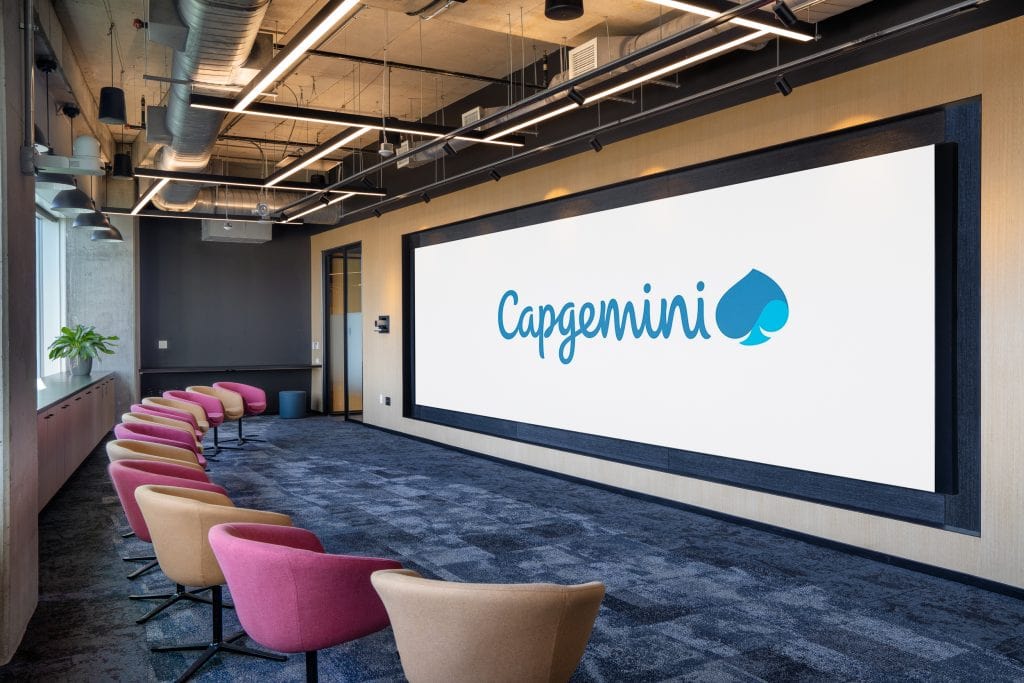 Capgemini Nashville 3 Modern conference room with large screen and colorful chairs.