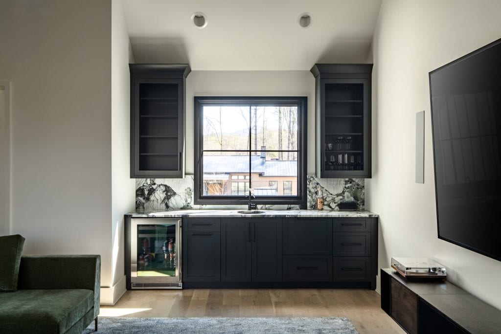 Flowering Vine 7 Home bar with a marble backsplash and a centered window view.