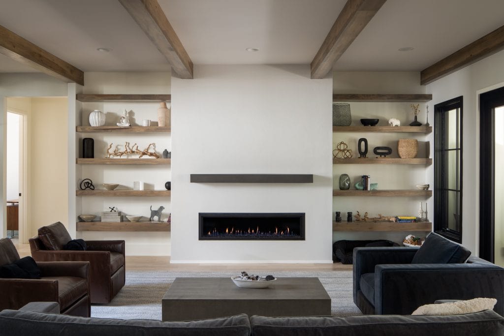 Flowering Vine 6 Living room with floating wooden shelves and a linear fireplace.