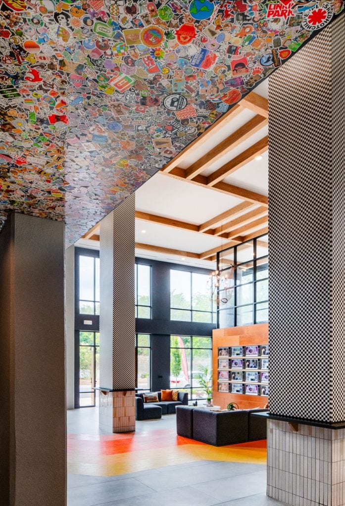 Broadstone Craft 5 Lobby view showing sticker ceiling and checkered columns.