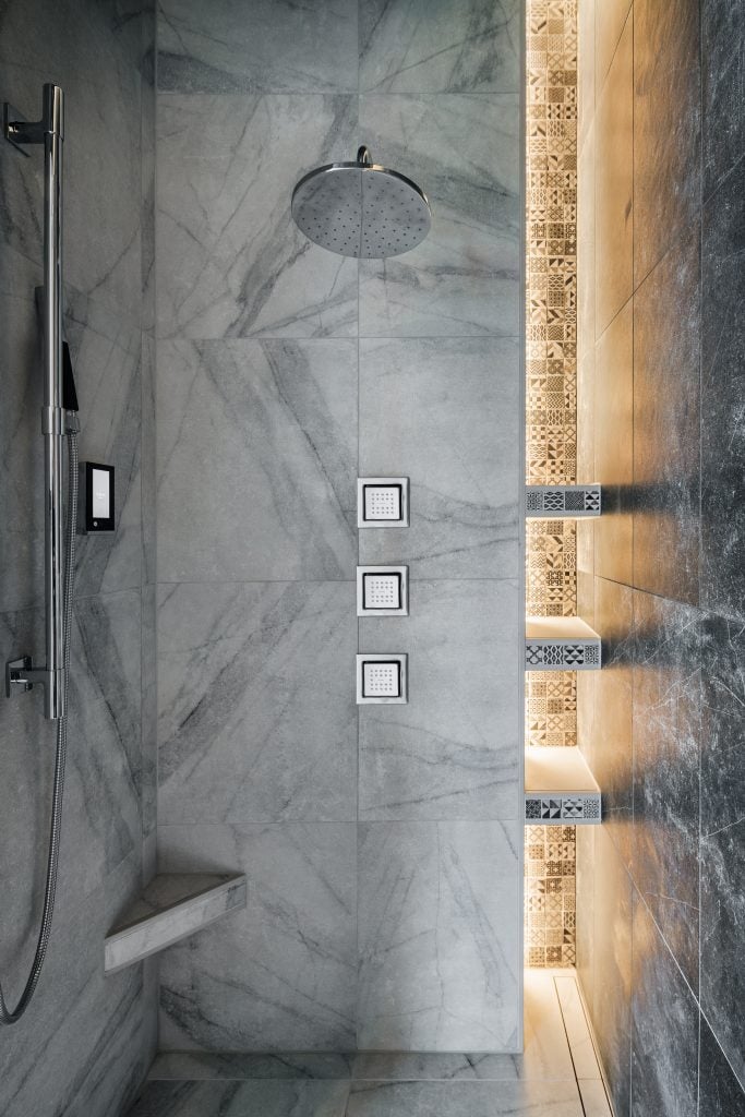 Crystal Lake 7 Luxury shower with LED lighting and marble walls.