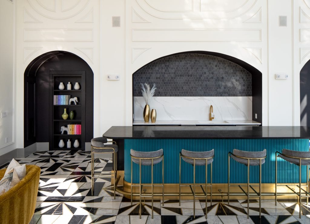 THE BOULEVARD 11 Modern bar design with marble countertops and decorative lighting in a residential amenity space.