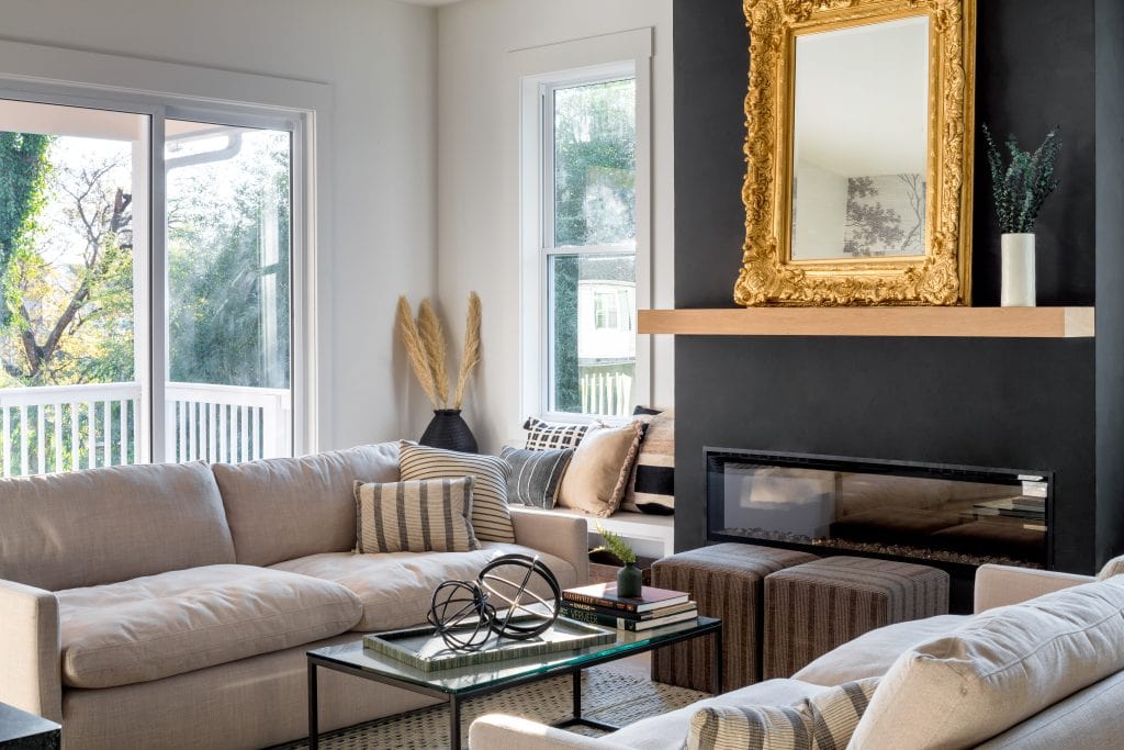 Eastside 4 Modern living room with fireplace and golden frame