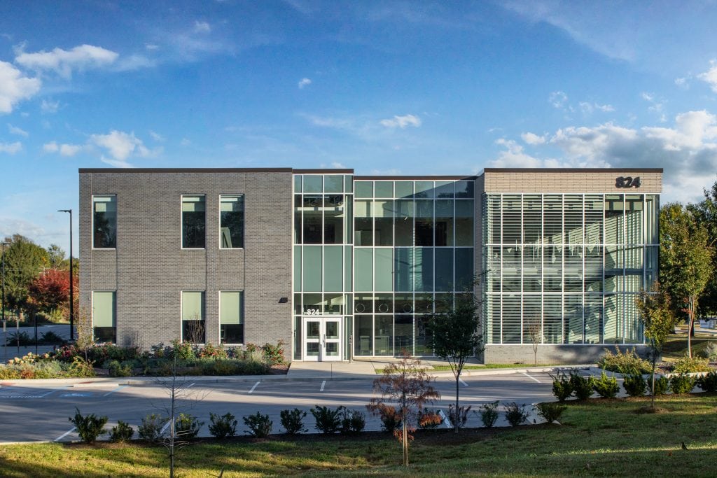 UKC COLDSTREAM 1 Front elevation of a modern research building with architectural features.