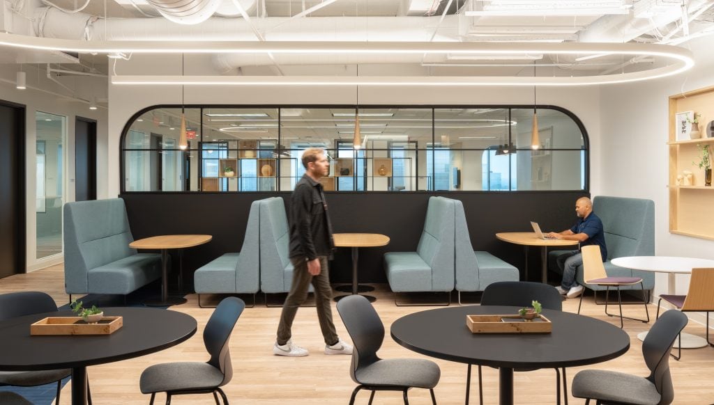 Capgemini Atlanta 6 Office dining area with modern booths and pendant lighting.