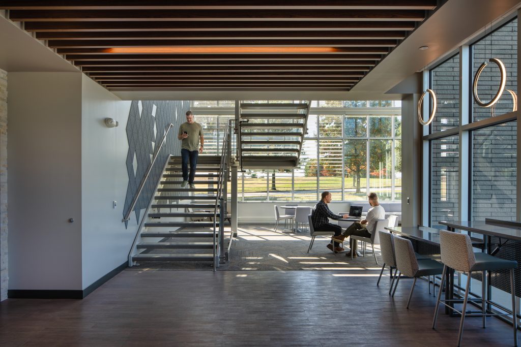 UKC COLDSTREAM 7 Stairwell and lobby area with modern lighting and sleek design.