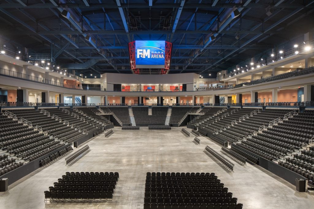 FM Bank Arena 11 Large event space with tiered seating and a massive LED screen.