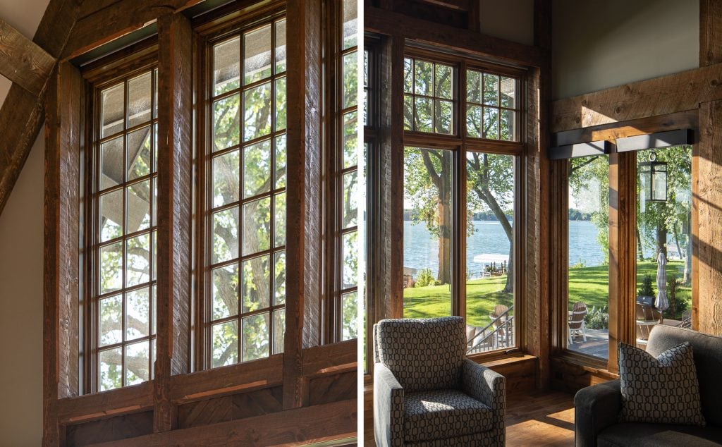 LAKE POLASKI 6 Tall wood-framed windows showing trees and lake view.